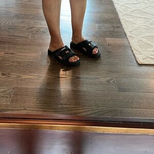 Brand new, never worn. Speedo water shoes size small. Adjustable straps!